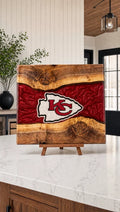 Red resin and walnut engraved board on a kitchen island