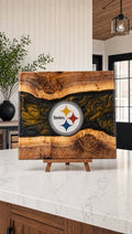 Black and gold resin walnut engraved board on a kitchen island