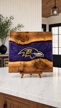 Purple and gold resin walnut engraved board on a kitchen island