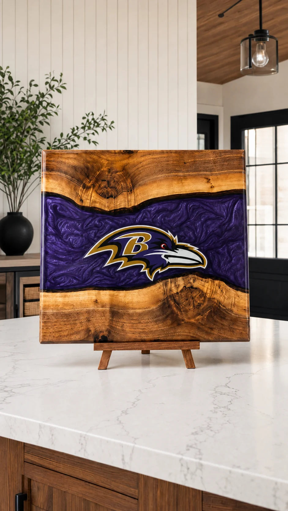 Purple and gold resin walnut engraved board on a kitchen island