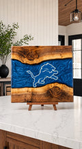 Walnut board with blue resin river and Detroit crest