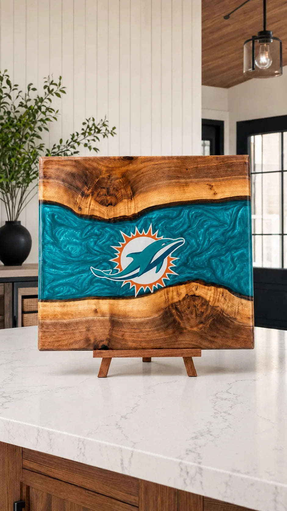 Walnut board with teal resin river and Miami crest