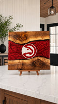 Walnut board with red resin river and hawk crest