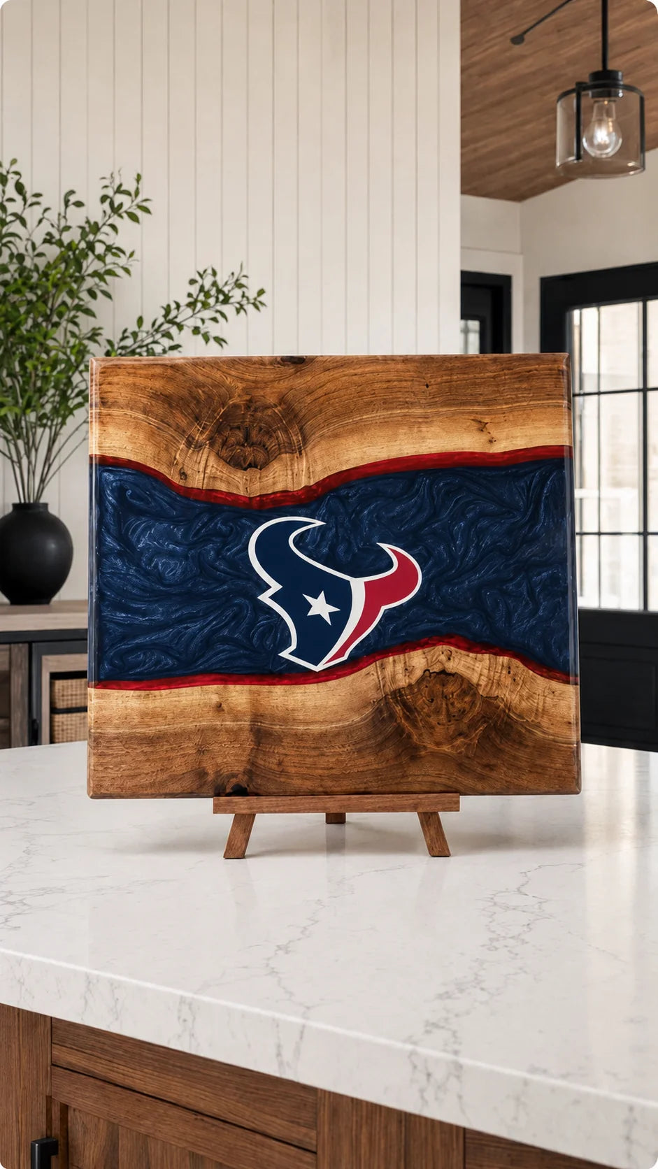 Walnut board with navy resin river and Houston crest